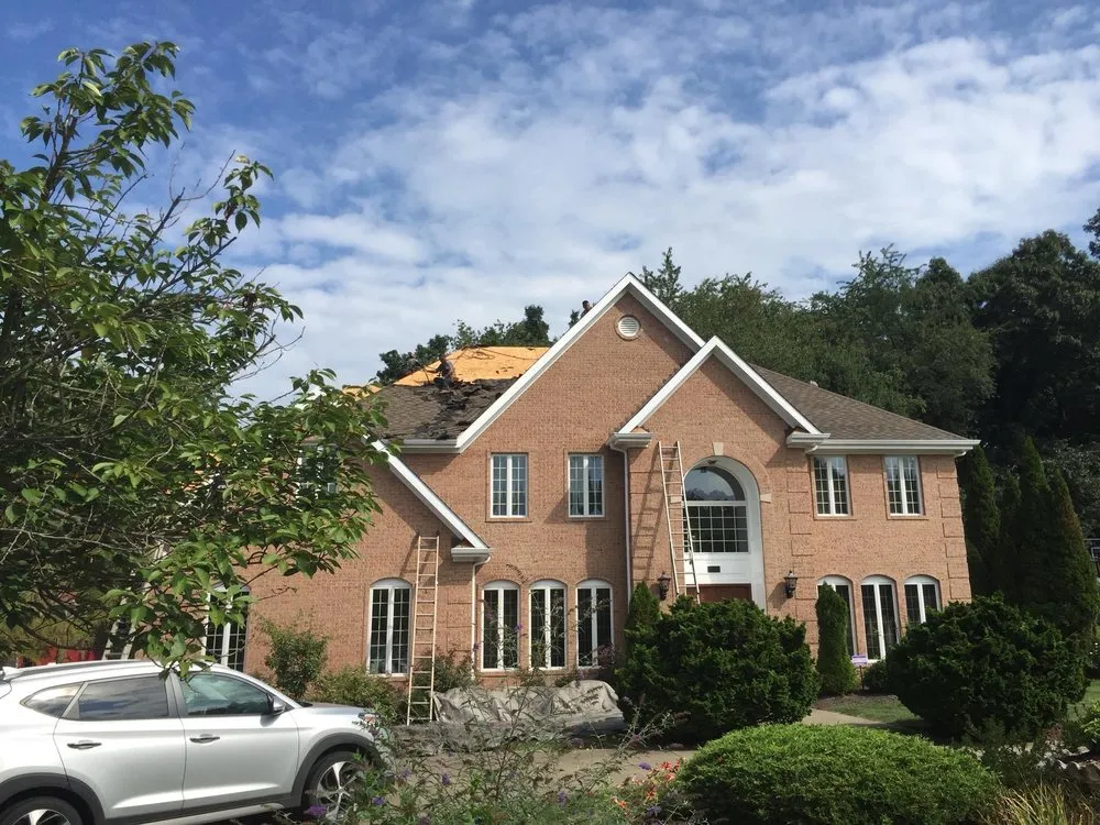 Slide of Chuck Romea Roofing