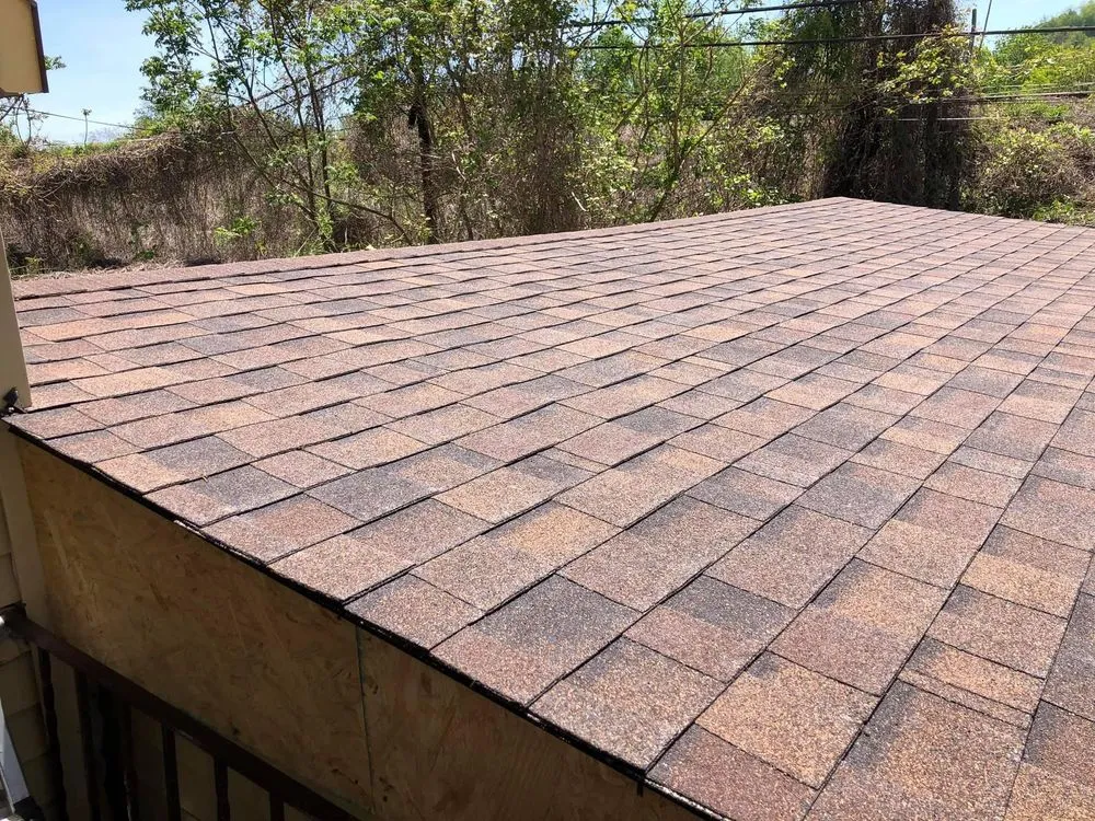 Slide of Chuck Romea Roofing