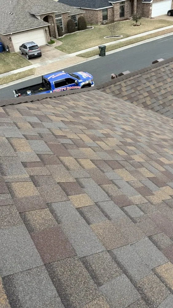 Slide of Chuy's Roofing