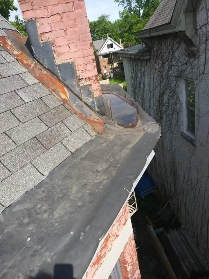 Slide of Cincinnati Roofing Gutters Masonry