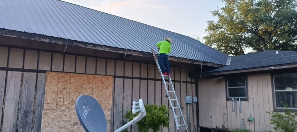 Slide of Cisneros Roofing