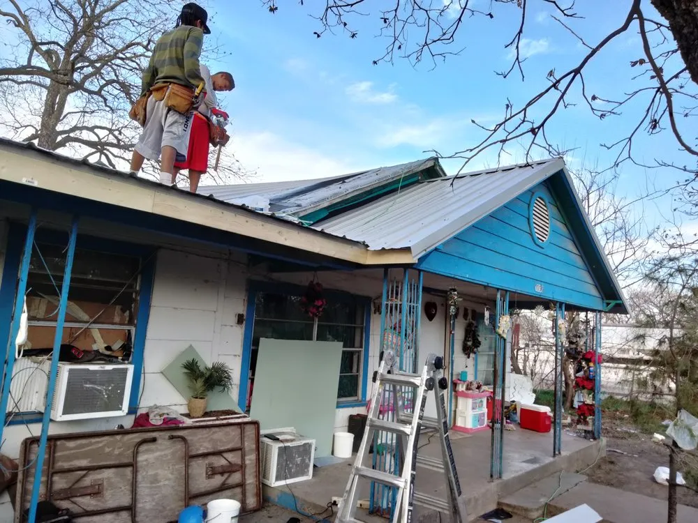 Slide of Cisneros Roofing