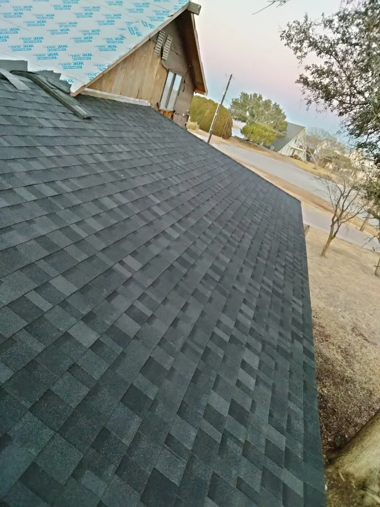 Slide of Cisneros Roofing