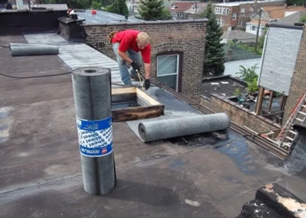 Slide of City Best Flat Roof Specialist And Tuckpointing