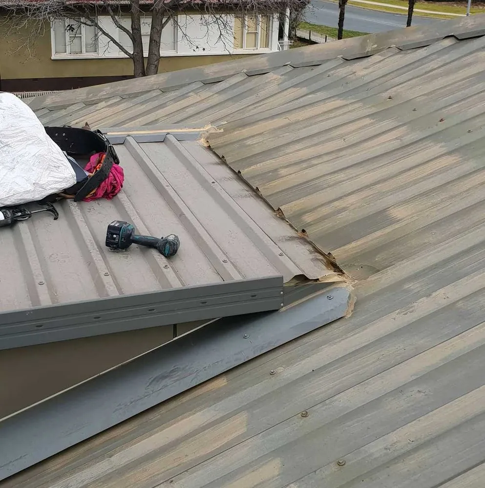 Slide of City Park Roofing