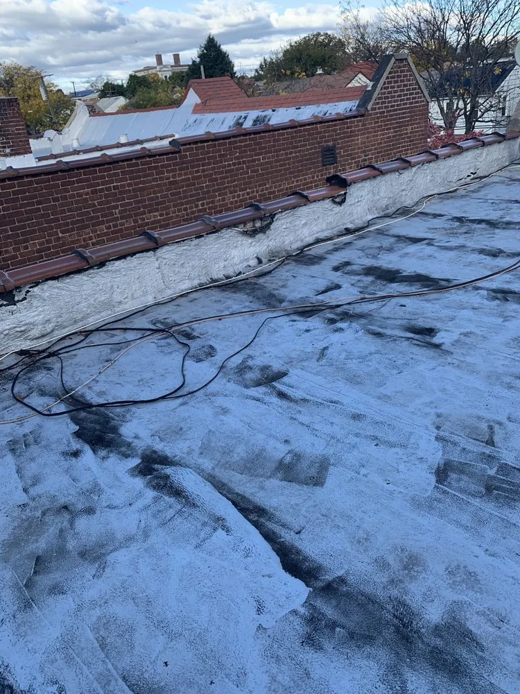 Slide of City Roofing Company NYC