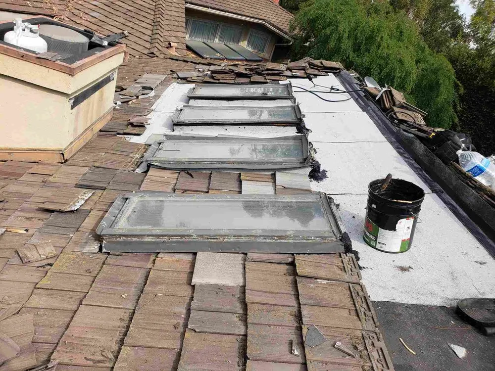 Slide of City Roofing