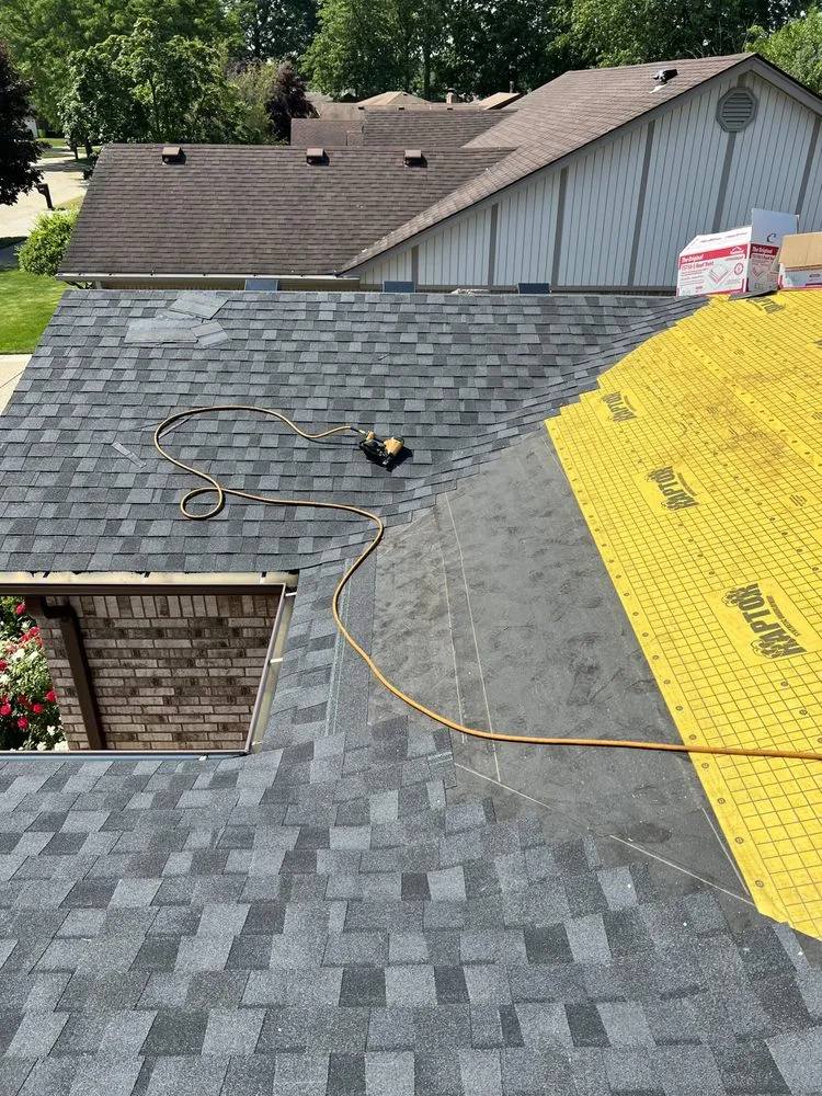 Slide of City Roofing