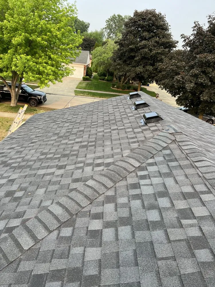 Slide of City Roofing