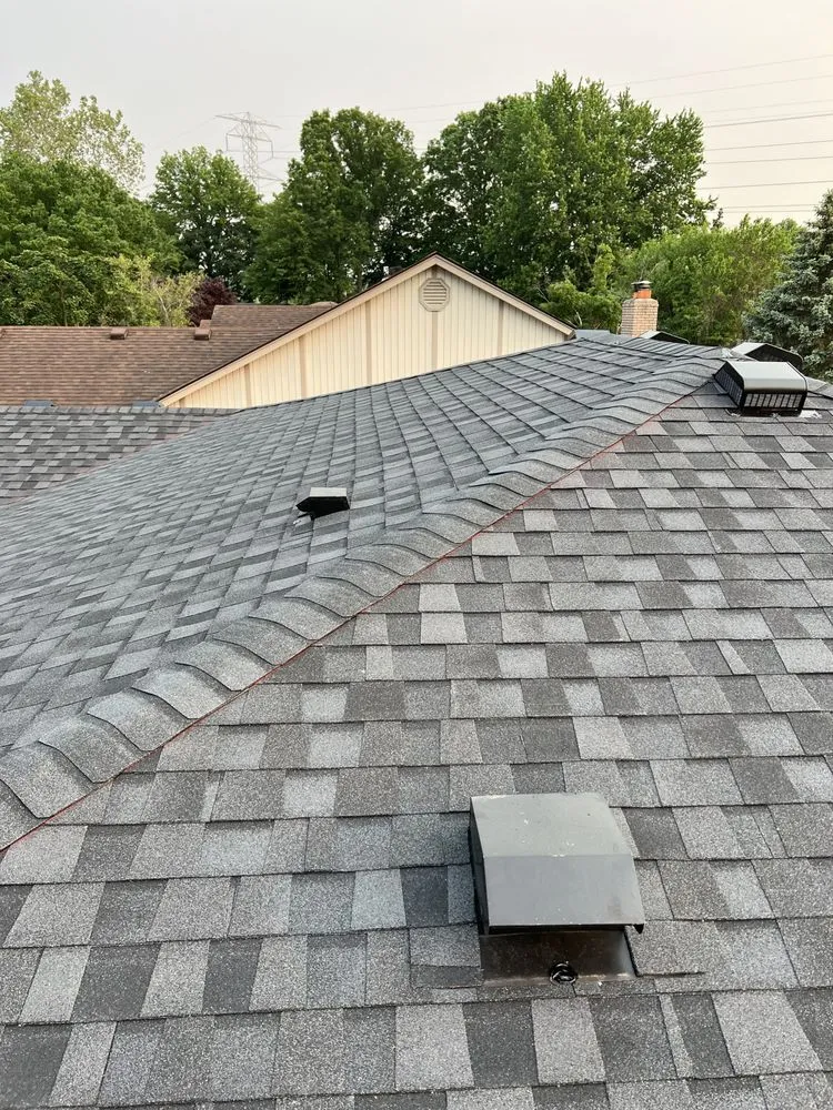 Slide of City Roofing