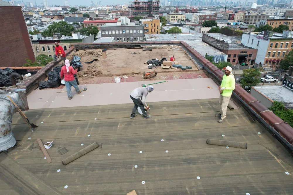 Local flat roof repair in Park, NY by City Suburb