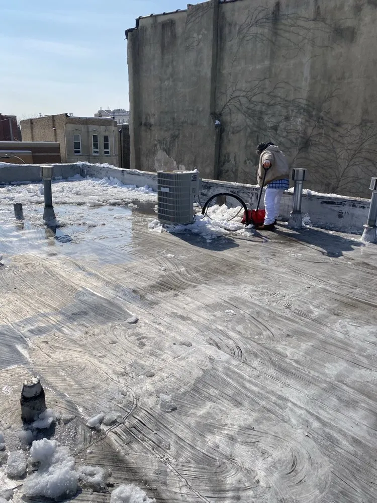 Slide of City Wide Flat Roofs