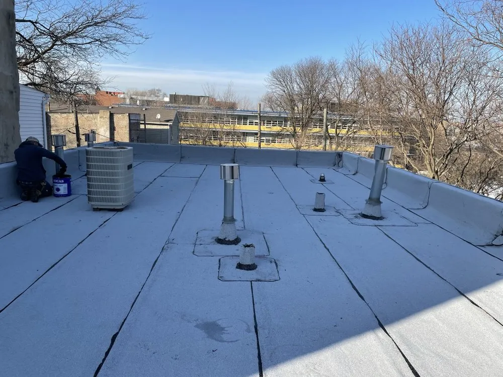 Slide of City Wide Flat Roofs