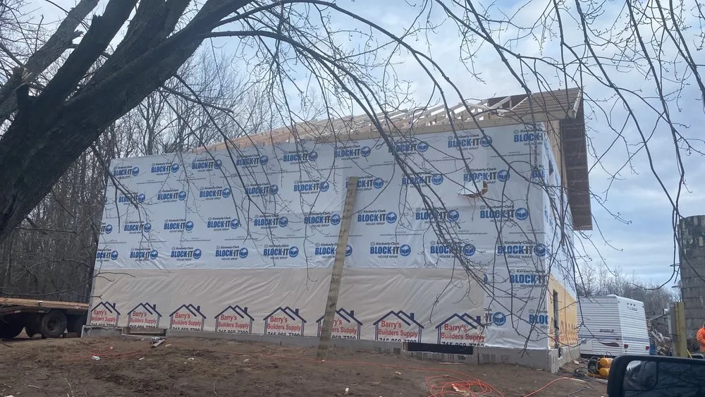 Slide of C&J Roofing