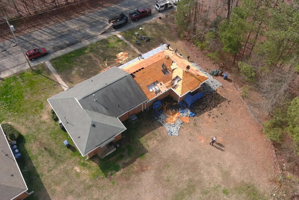 Slide of C&J Storm Repair Team