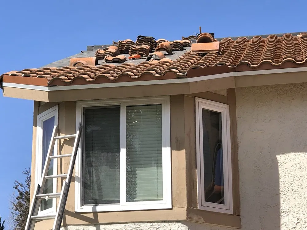 Slide of CJ West Roofing