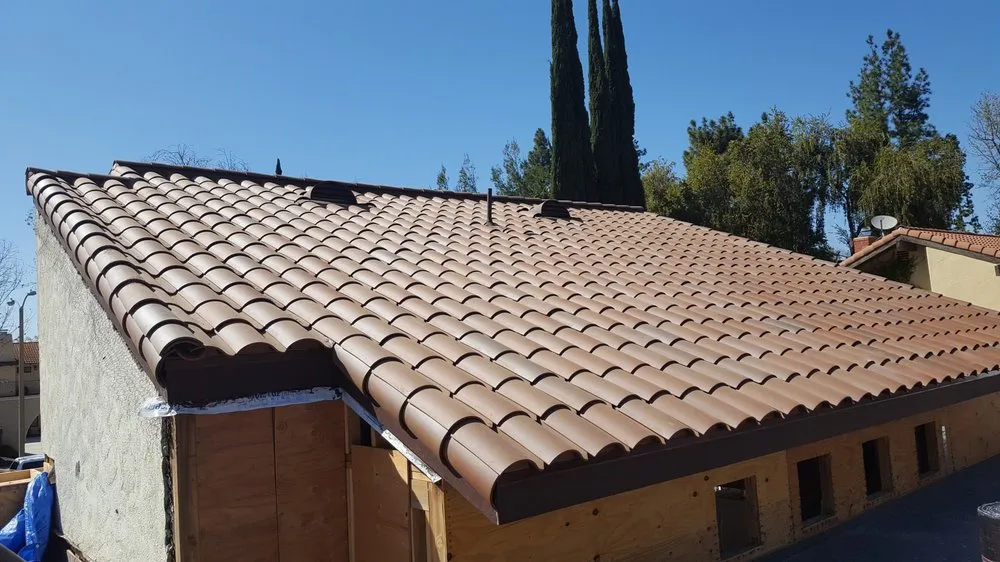 Slide of CJ West Roofing