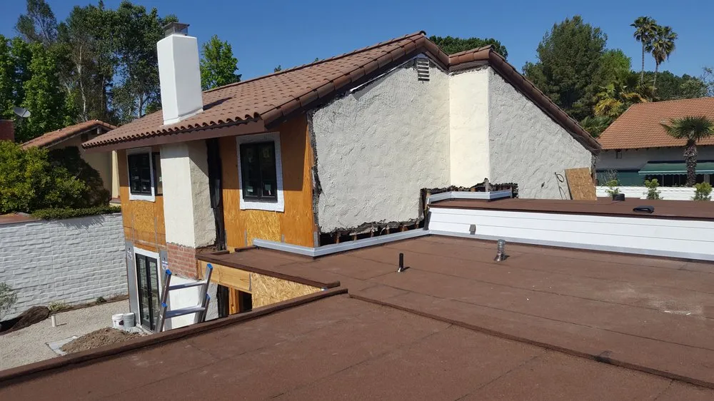 Slide of CJ West Roofing