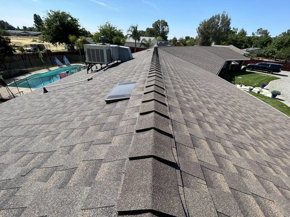 Slide of CJM Roofing