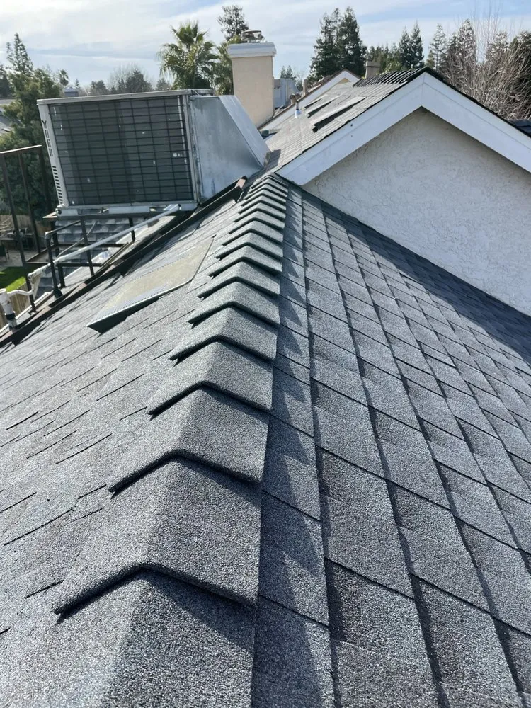Slide of CJM Roofing