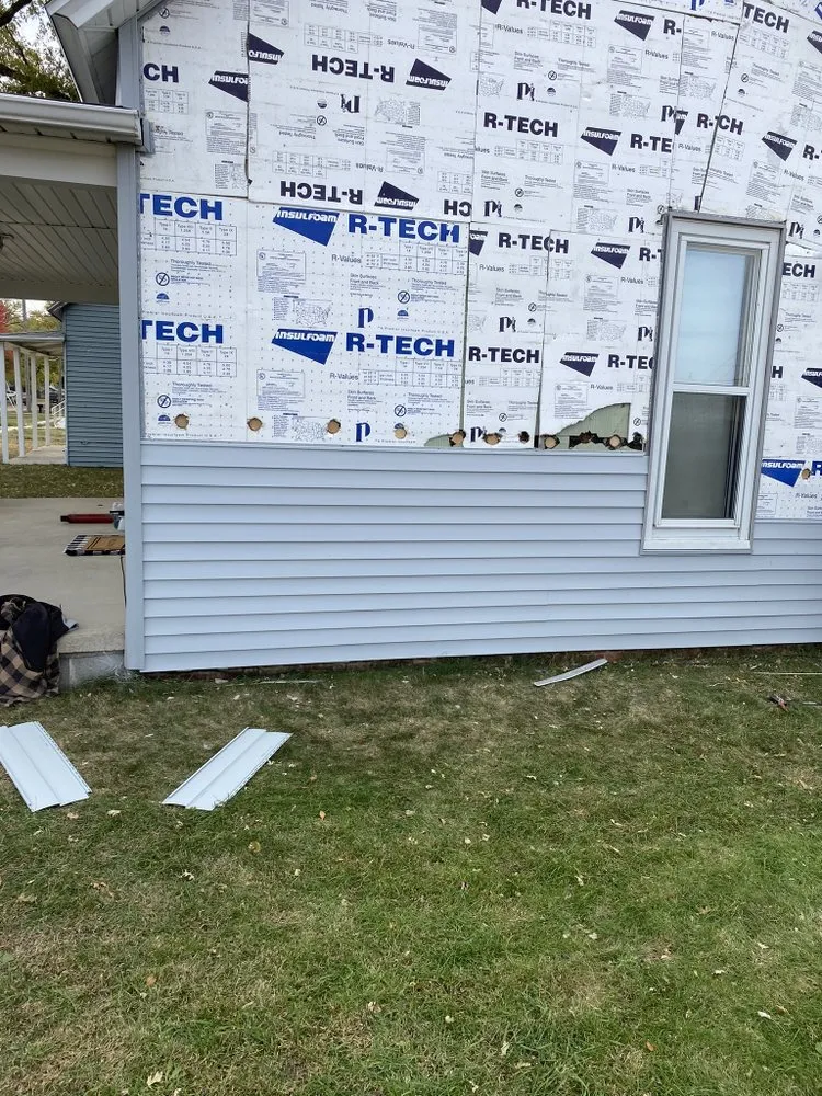 Slide of Clark's Roofing and Gutters