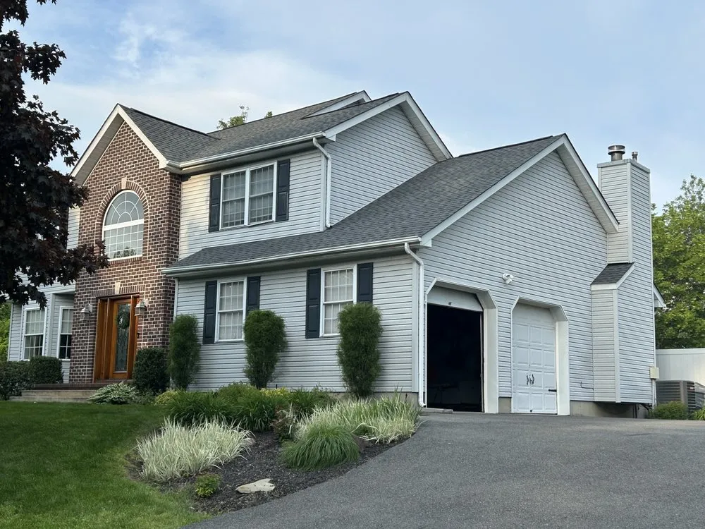 Slide of Class Act Roofing