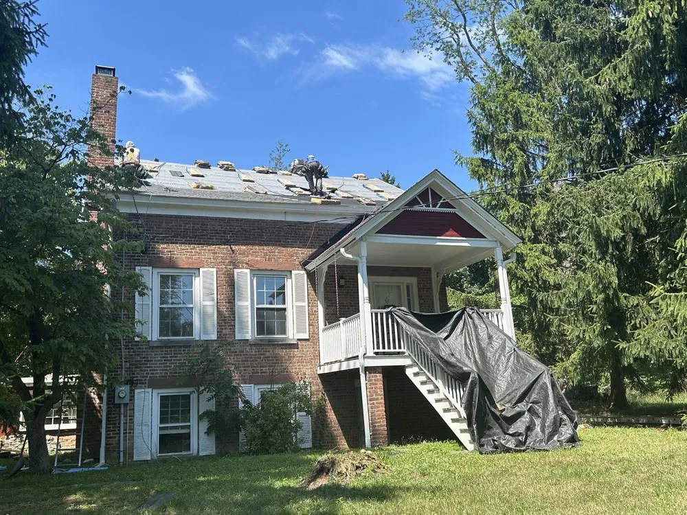 Slide of Class Act Roofing