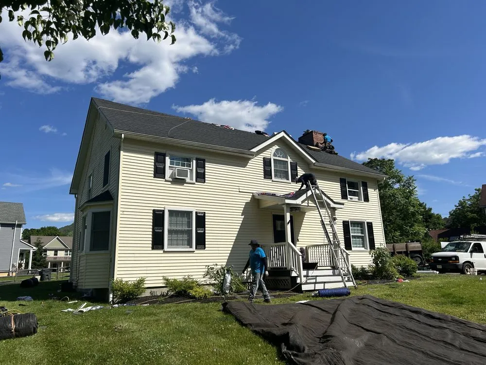 Slide of Class Act Roofing