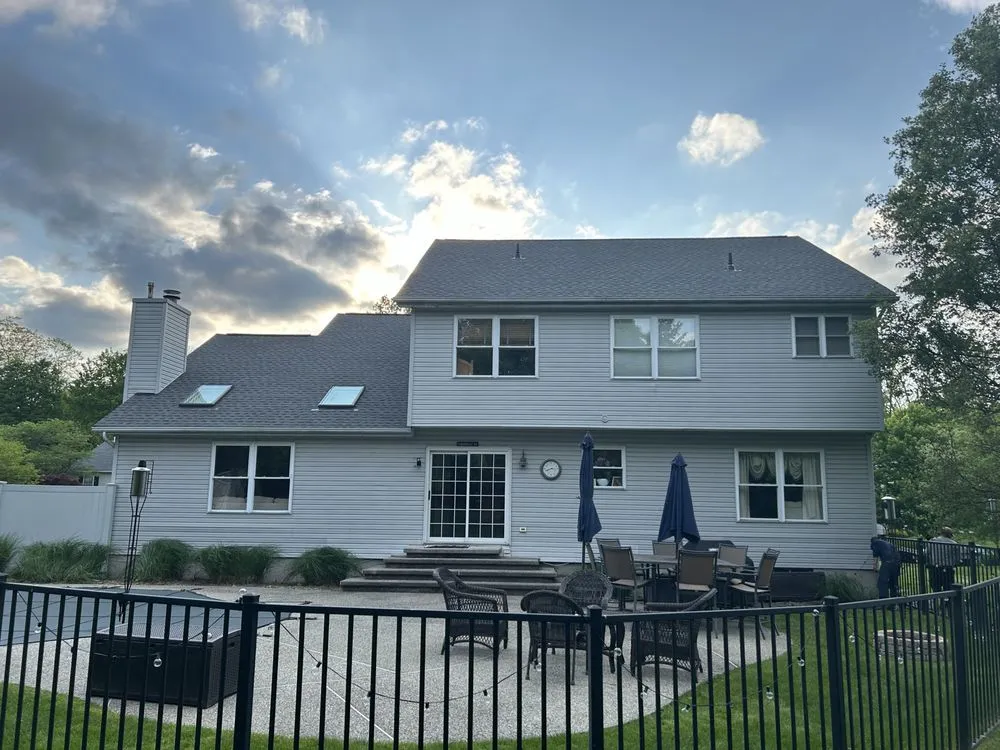 Slide of Class Act Roofing