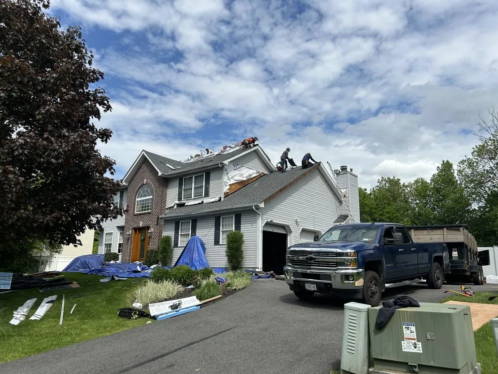 Slide of Class Act Roofing