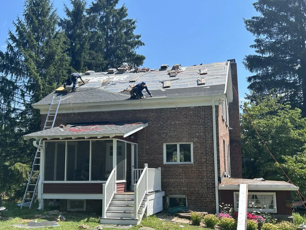 Slide of Class Act Roofing