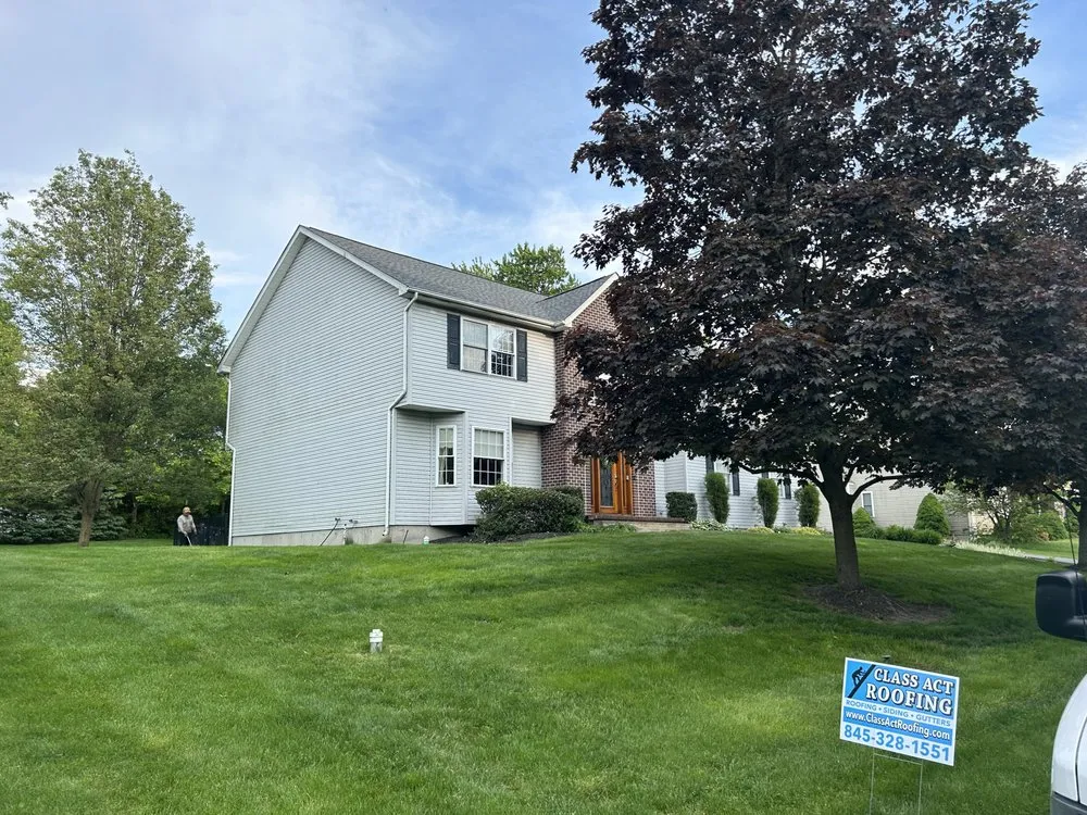 Slide of Class Act Roofing