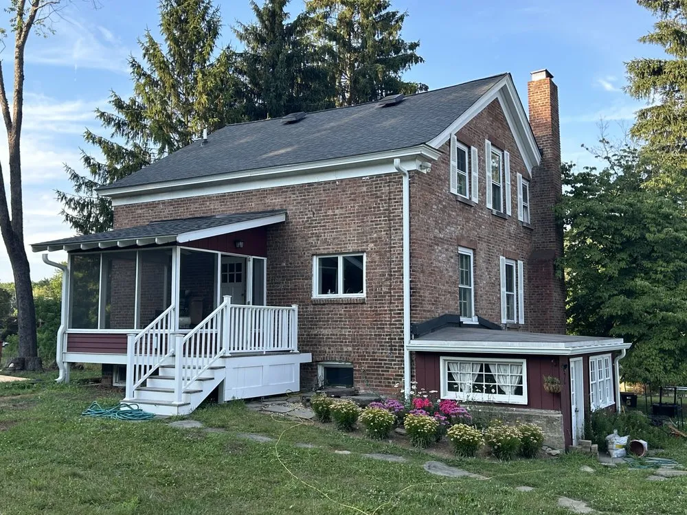 Slide of Class Act Roofing