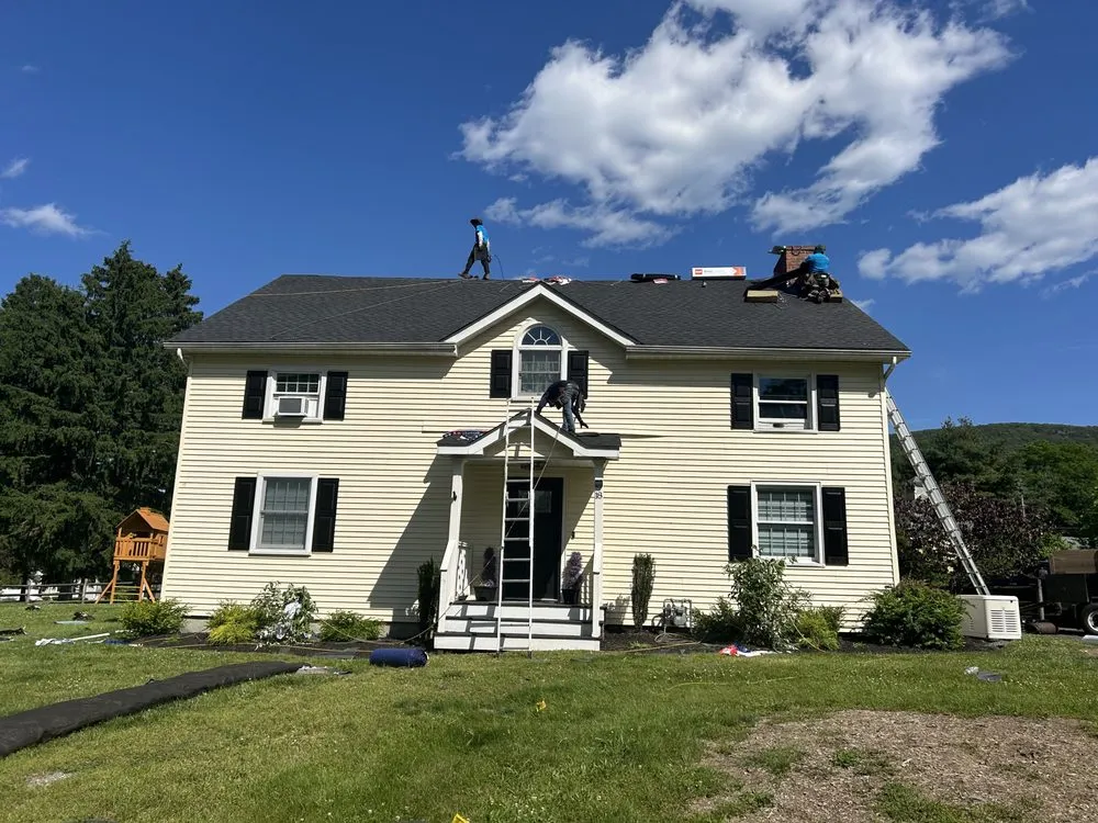 Slide of Class Act Roofing