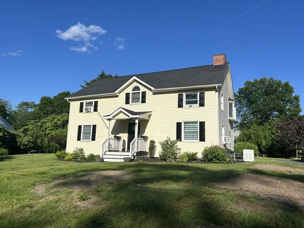 Slide of Class Act Roofing