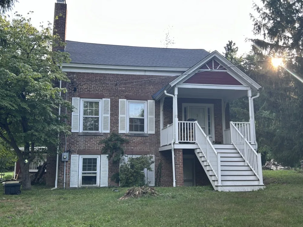 Slide of Class Act Roofing