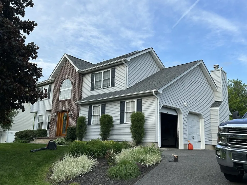 Slide of Class Act Roofing