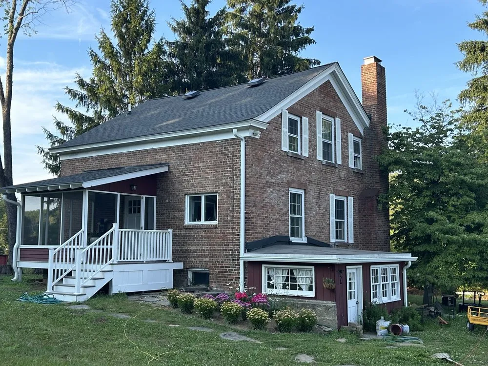 Slide of Class Act Roofing