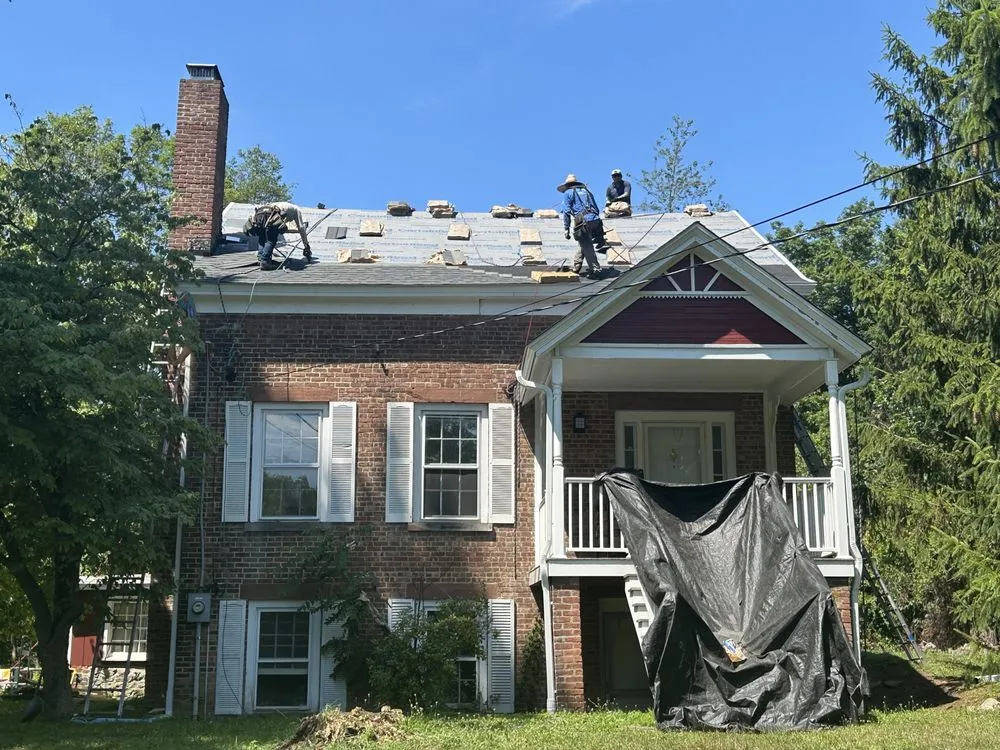 Slide of Class Act Roofing