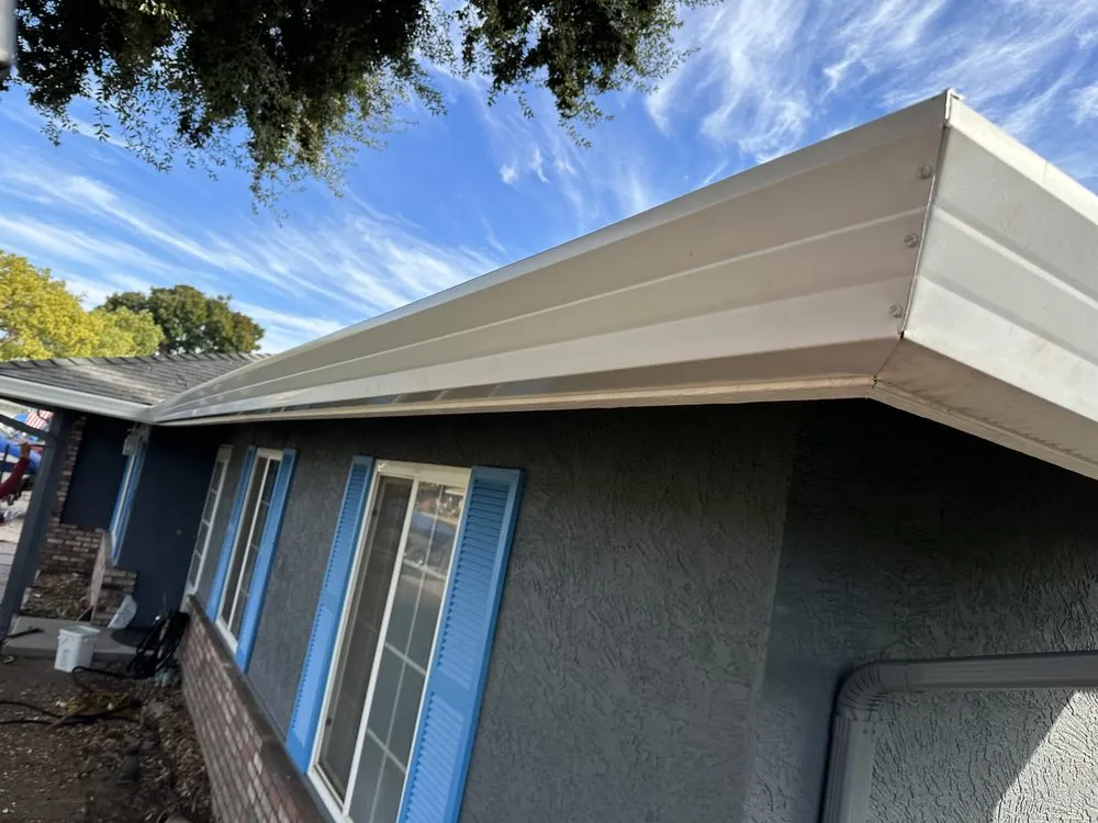 Slide of Claudex Roofing