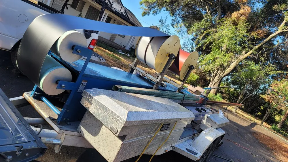 Slide of Claudex Roofing