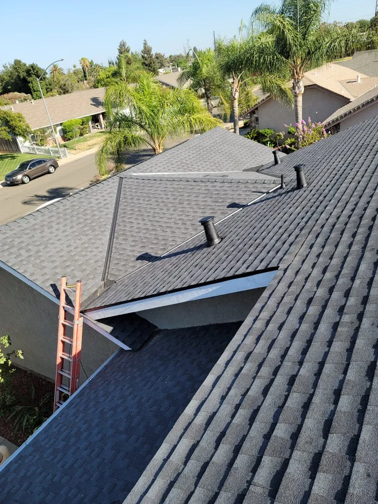 Slide of Claudex Roofing