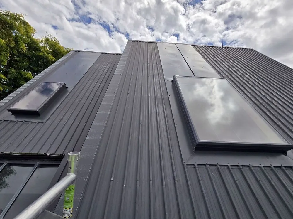 Slide of Claybrooke Roofing