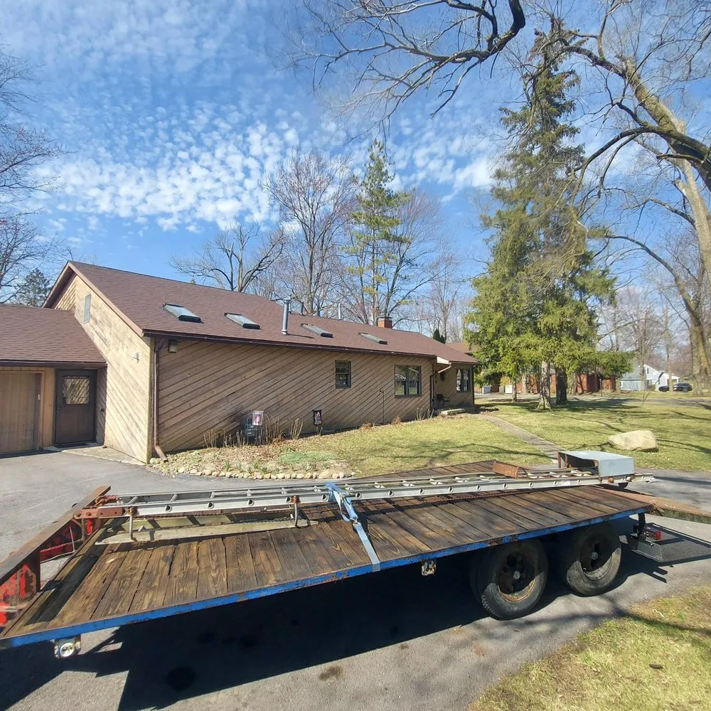 Slide of Clayton Roofing