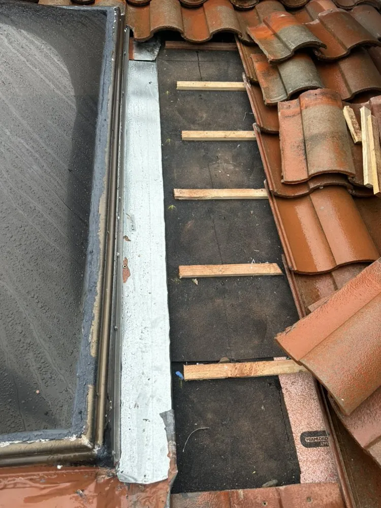 Slide of Cleans Roofing