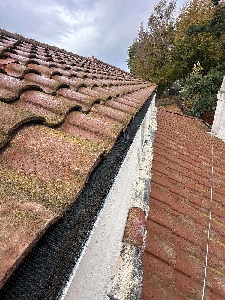 Slide of Cleans Roofing