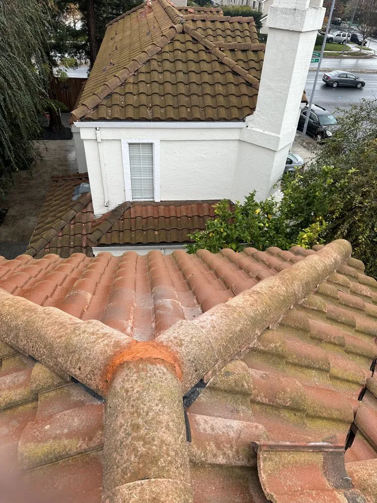 Slide of Cleans Roofing