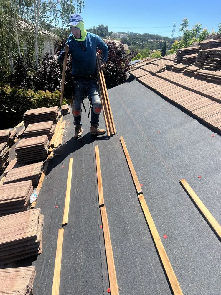 Slide of Cleans Roofing