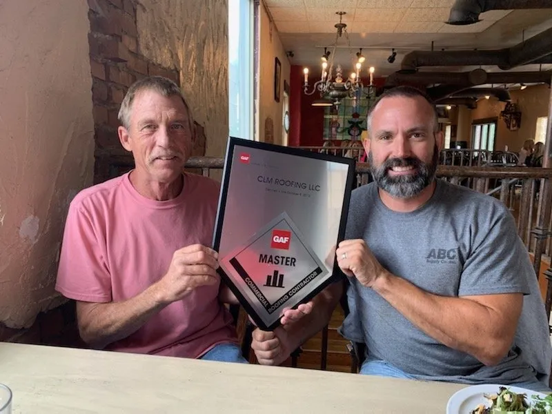 Slide of CLM Roofing