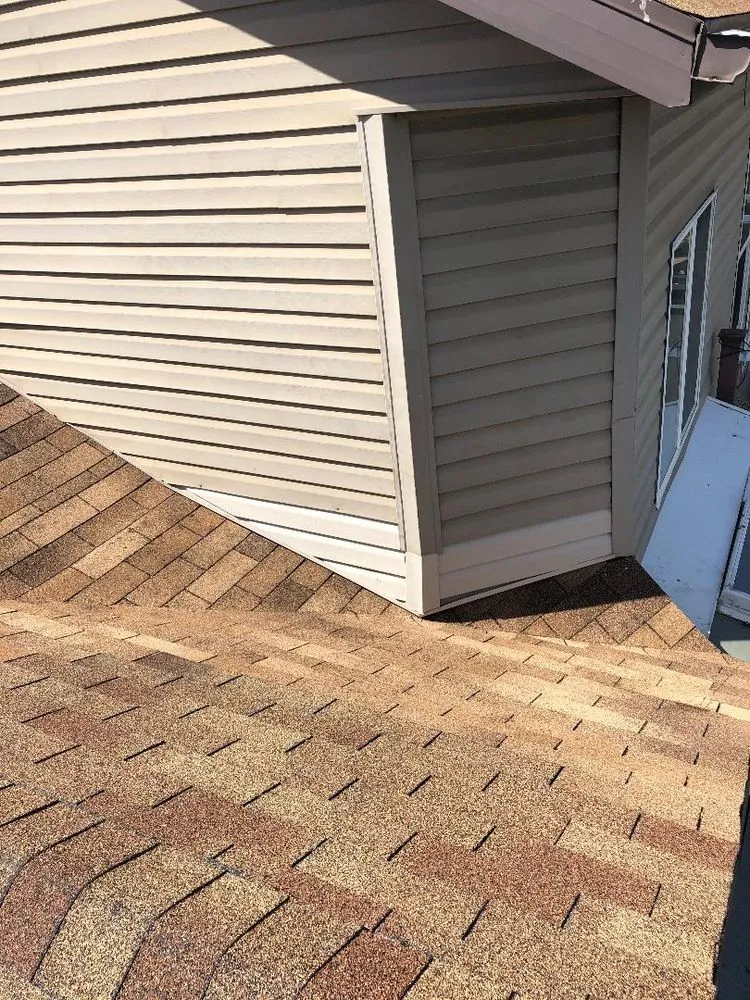 Slide of CLM Roofing